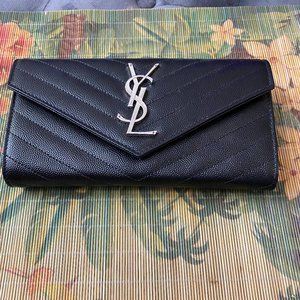 Yves Saint Laurent Women's Monogram Large Flap Wallet in embossed leather